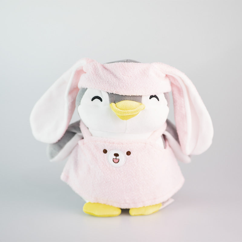 Peluche pinguino PenPen grigio travestito da Coniglio rosa